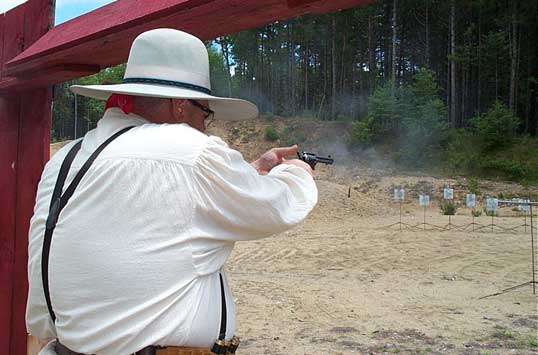 Jake Mountain shooting pistol ...