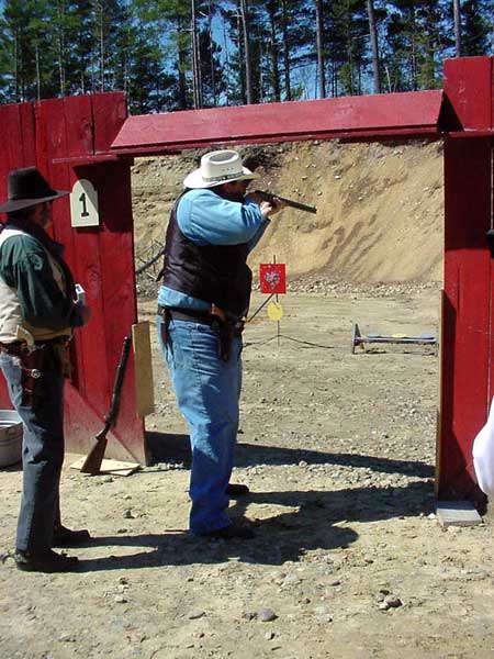 Toledo Kid shooting rifle.