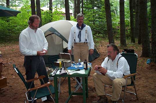 Cleaning guns at the campsite - 2003 Fracas at Pemi Gulch.