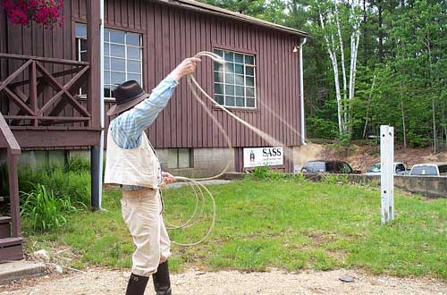 Slim 4 Eyes lassoing the post with Dead Head's lariet, May 2004.