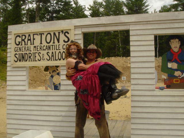 Yukon Mike manhandling Hermit Josephine.