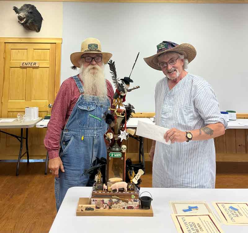 Order of the Crow. Wheat Lightnin' awarding it to Black Jack Daniels.