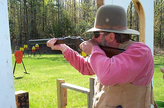 ... and with his rifle.